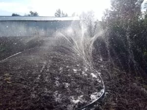 Rain hose irrigation system