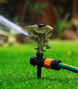 Metallic impact sprinklers