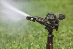 Plastic impact sprinklers
